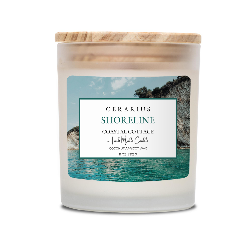 Candle with a coastal design label on a white background