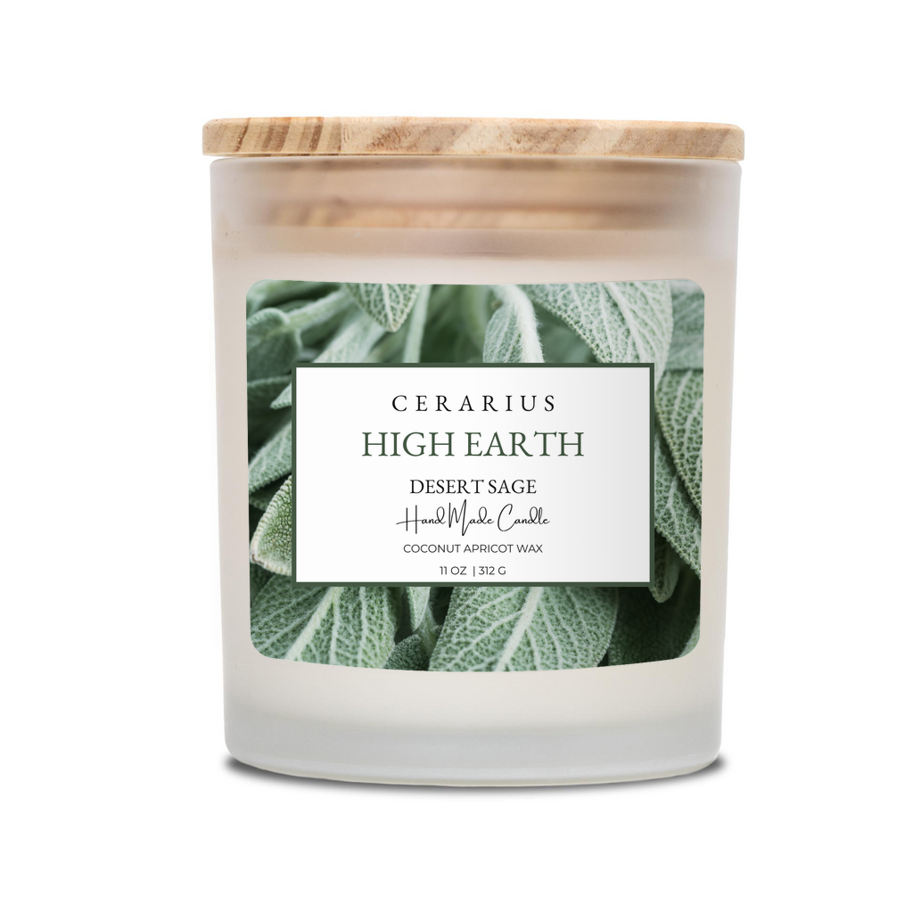 Candle with a wooden lid and green leaf design on a white background